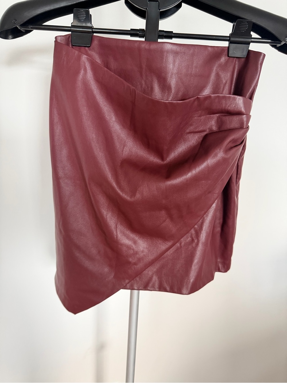 Asymmetrical Faux Leather Mini Skirt in Wine